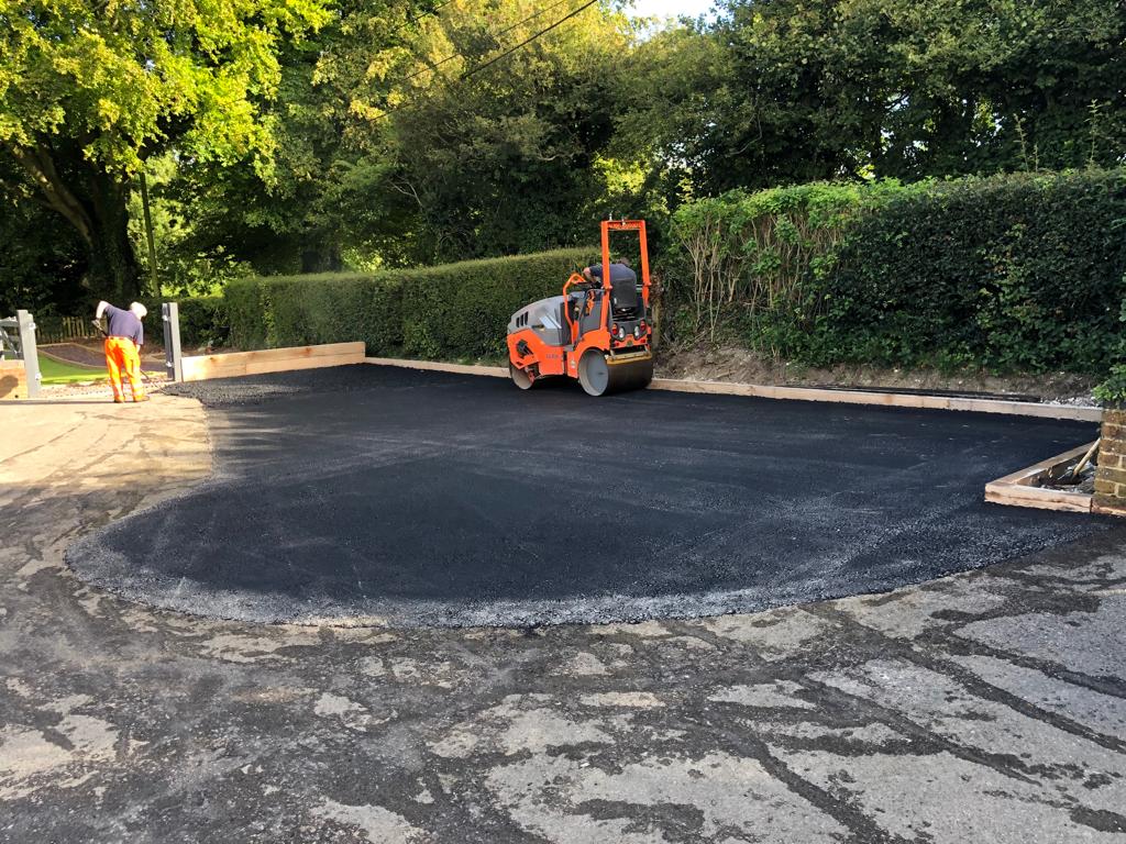 This is a photo of a bitumen driveway which is in the process of being installed by Kenilworth Asphalt & Bitumen Surfacing