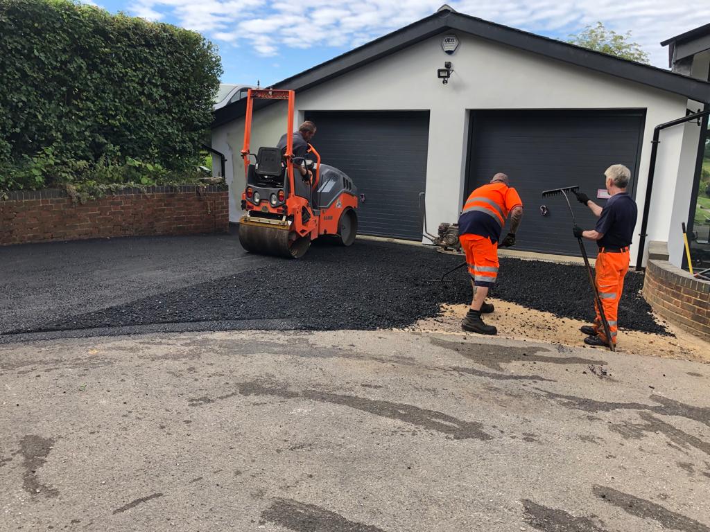 This is a photo of a bitumen driveway which is in the process of being installed by Kenilworth Asphalt & Bitumen Surfacing